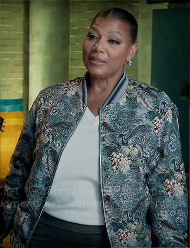 Robyn's floral and bird print bomber jacket on The Equalizer