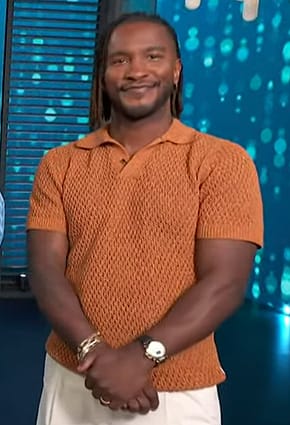 Scott's orange knit polo on Access Hollywood