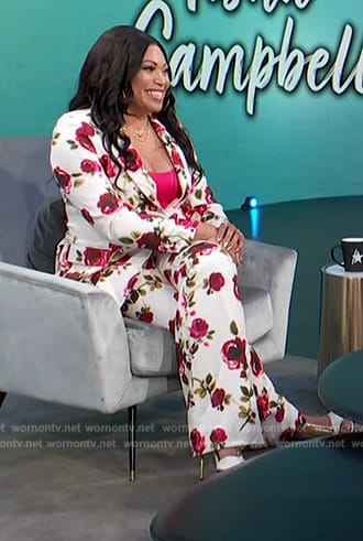 Tisha Campbell's white floral print suit on Access Hollywood