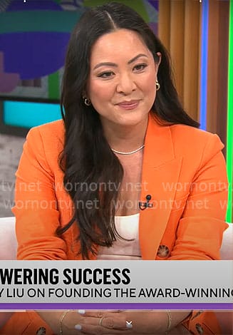Amy Liu's orange blazer and shorts set on CBS Mornings