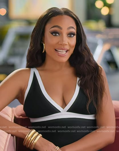 Brandi's black confessional swimsuit on Selling the OC