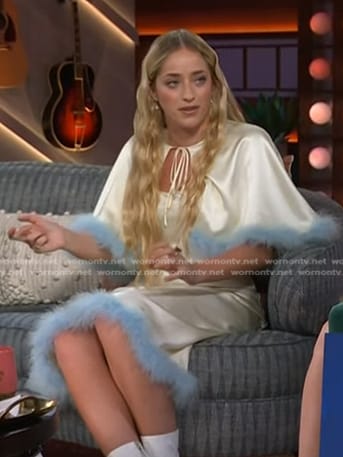 Brynn Cartelli's white feather trim cape and dress on The Kelly Clarkson Show