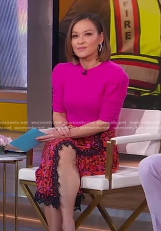 Eva's pink short sleeve sweater and floral lace trim skirt on Good Morning America