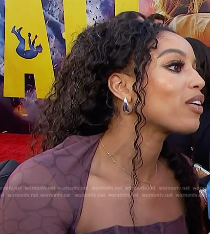 Francesca Amiker's purple corset top on E! News