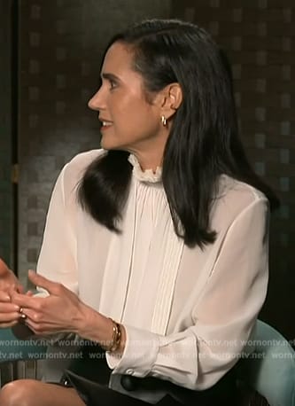 Jennifer Connelly's white pleated blouse on Access Hollywood