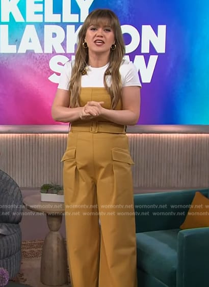 Kelly's mustard strapless belted jumpsuit on The Kelly Clarkson Show