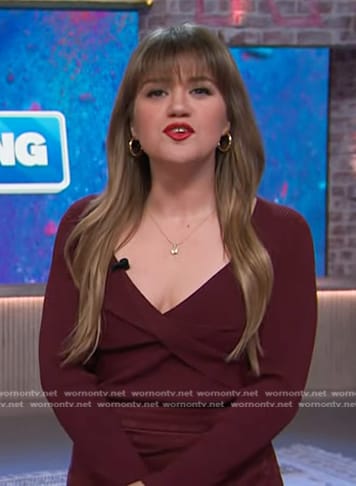 Kelly's burgundy twist front top and suede wrap skirt on The Kelly Clarkson Show