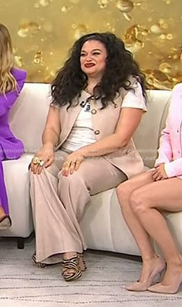 Michelle Buteau's beige button up vest top and pants suit on Today