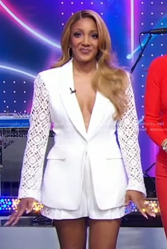 Mickey Guyton's white crochet sleeve blazer and shorts on Good Morning America