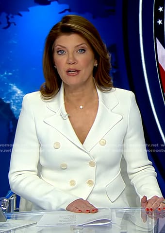 Norah's white double breasted knit blazer on CBS Evening News