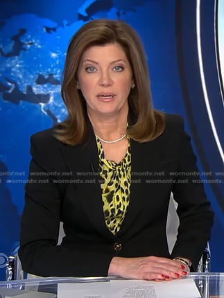 Norah's yellow leopard blouse and black blazer on CBS Evening News