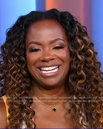 Kandi Burruss's black and gold clover necklace on Good Morning America