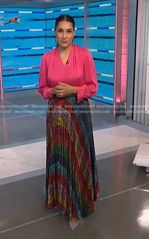 Morgan's pink blouse and rainbow pleated skirt on NBC News Daily