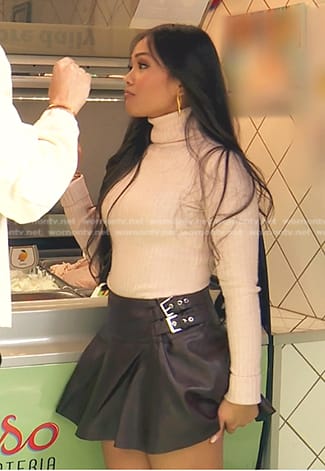 Jenn's pink turtleneck sweater and mini skirt on The Bachelorette