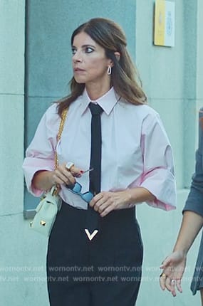 Carmen's metal tipped tie on Elite