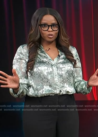 Jacqueline Coley's green satin blouse on Access Hollywood