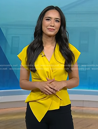 Emilie Ikeda's yellow twist short sleeve top on Today