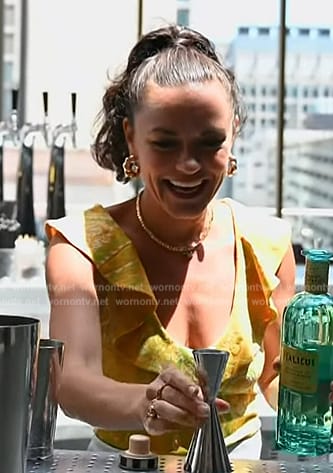Lindsay Myer's yellow ruffle top on Access Hollywood