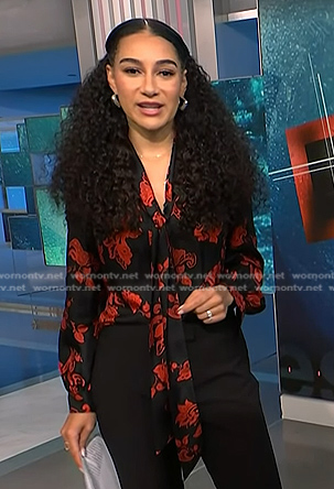 Morgan's black and red print tie neck blouse on NBC News Daily