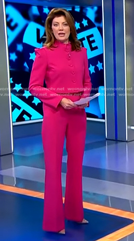 Norah's fuchsia cropped jacket and pants on CBS Evening News
