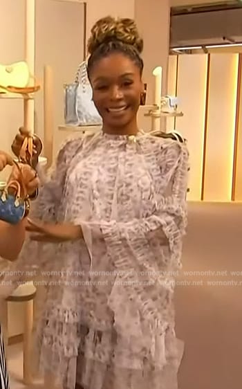 Zuri's white sheer ruffle detail dress on Access Hollywood