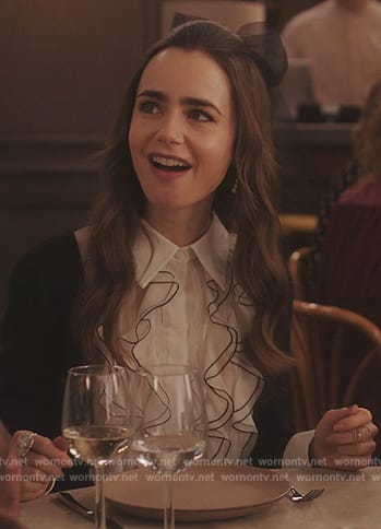 Emily's black ruffle trim dress on Emily in Paris