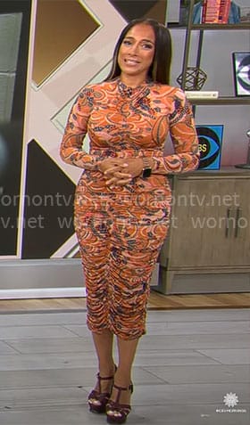 Michelle Miller's orange printed ruched dress on CBS Mornings