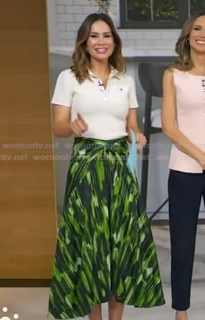 Rebecca's white polo and green print skirt on Good Morning America