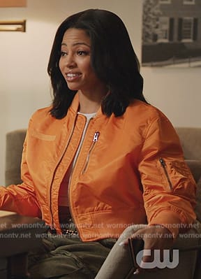 Thea's orange satin jacket on All American Homecoming