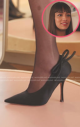 Genevieve's black bow pumps on Emily in Paris