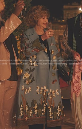 Antonia's blue floral coat on Emily in Paris