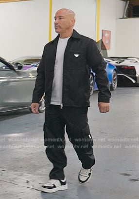 Brett's black prada jacket and pants on Selling Sunset
