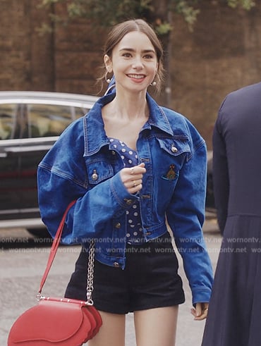 Emily's blue polka dot blouse and denim jacket on Emily in Paris