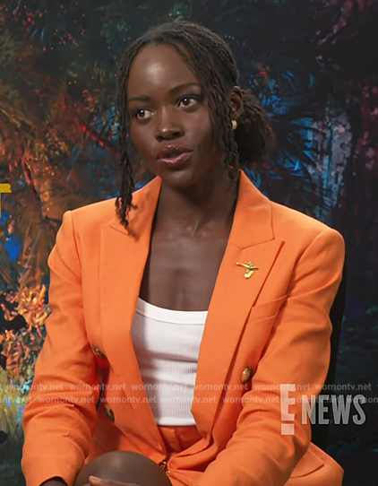 Lupita Nyong'o's orange double breasted blazer on E! News