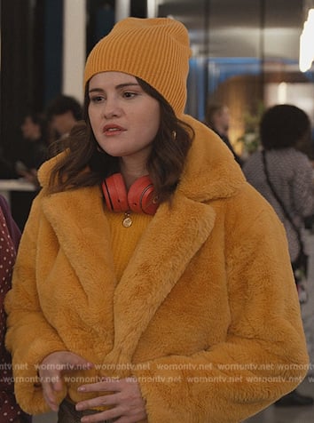 Mabel's yellow fur jacket and pants on Only Murders in the Building