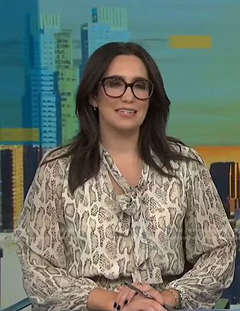 Savannah’s snake print tie neck dress on NBC News