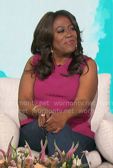 Sheryl's pink knit peplum top on The Talk