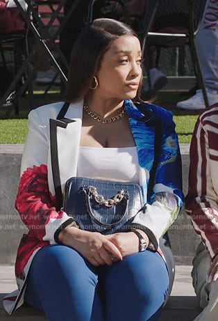 Tina's white floral print blazer on All American Homecoming