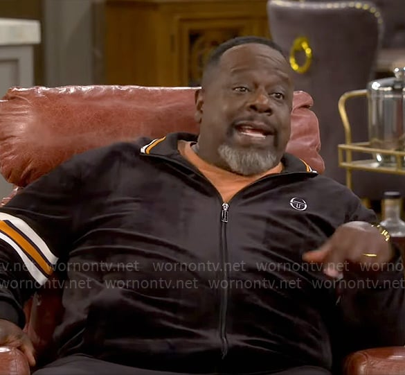 Calvin's black velour track jacket on The Neighborhood
