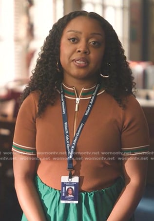 Janine's brown quarter zip top on Abbott Elementary