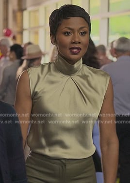 Jax's green satin mock neck top on Reasonable Doubt