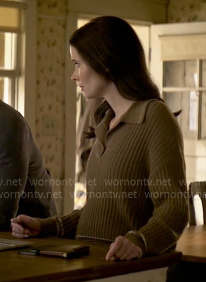 Lois's brown polo sweater on Superman and Lois