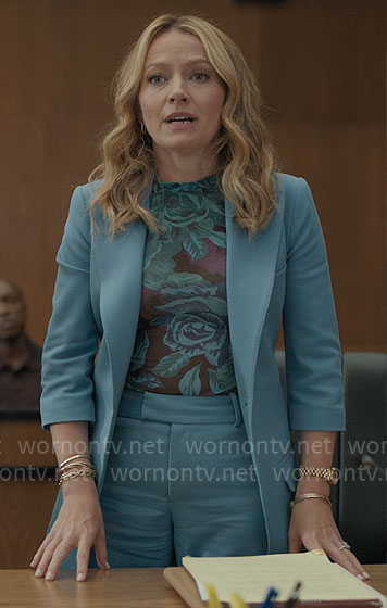 Lorna's blue suit, floral top, and polka dot bag on The Lincoln Lawyer