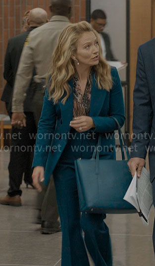 Lorna's teal suit with printed blouse on The Lincoln Lawyer