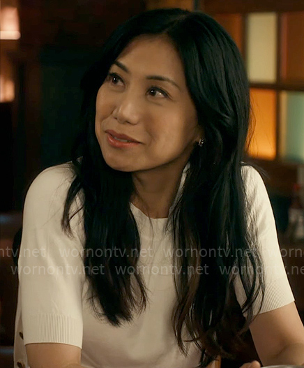 Mel's white short-sleeve sweater on The Equalizer