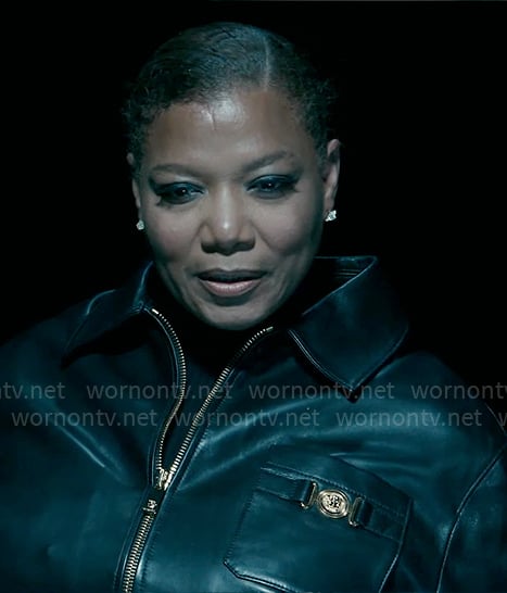 Robyn's leather jacket with gold details on The Equalizer