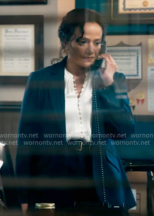 Selena's white button down blouse on High Potential