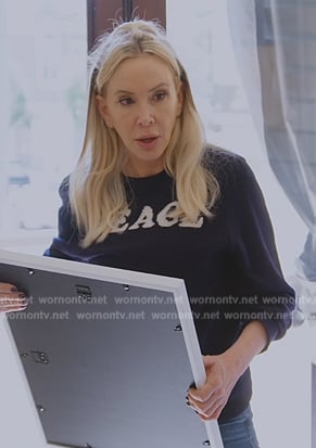 Shannon's black peace sweater on The Real Housewives of Orange County