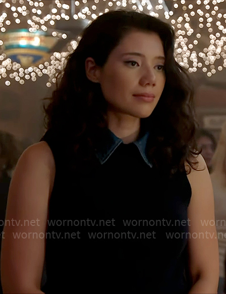 Violet's navy sweater vest with denim collar on Chicago Fire