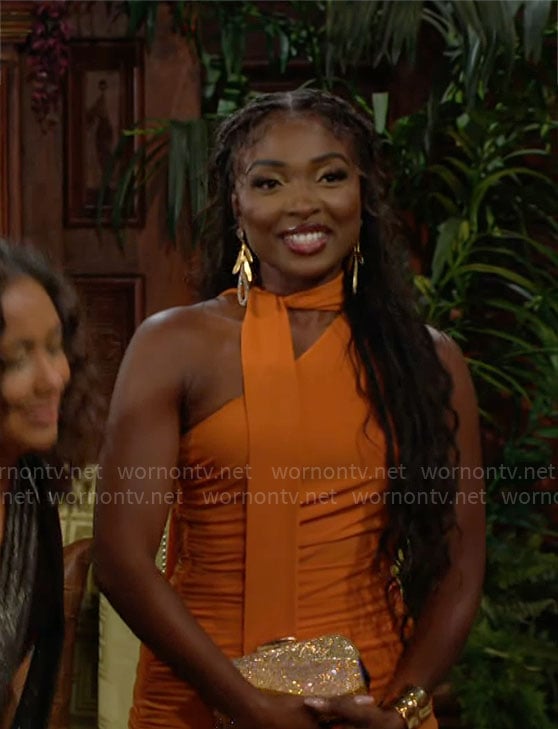 Ana's orange one-shoulder dress at Ashley & Devon's wedding on The Young and the Restless